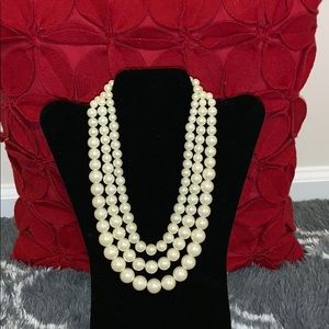 Three strand pearl necklace